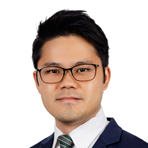A person in a suit and tie
Description automatically generated